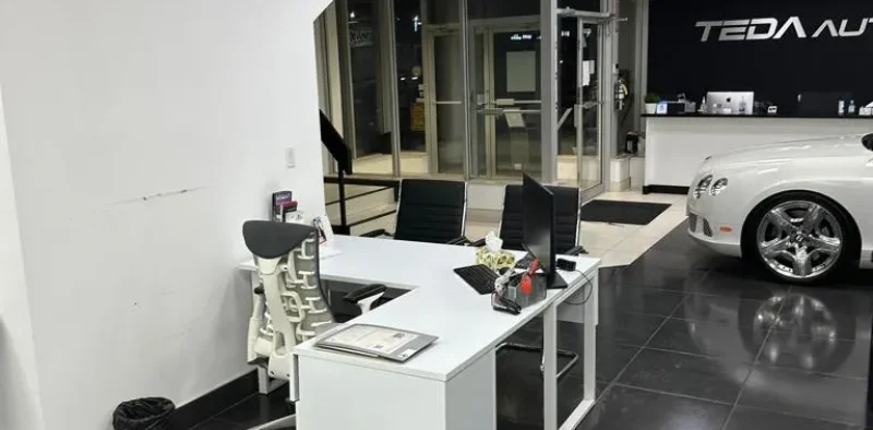 cleaning reception area of car dealership